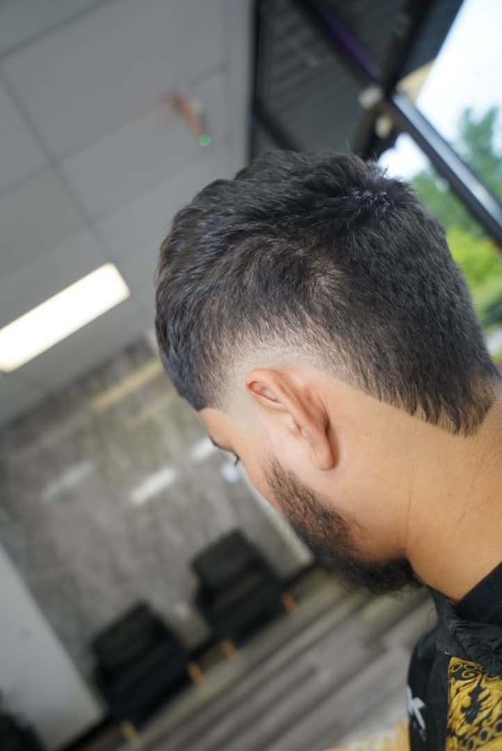 Textured fade with beard lineup